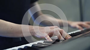 To play the piano, hands playing the piano