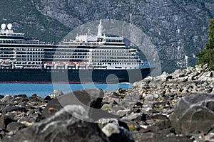 a big cruise liner is passing a narrow place in the Glacier Bay - Alaska