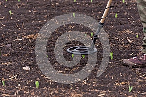 To seek treasures on earth with a metal detector