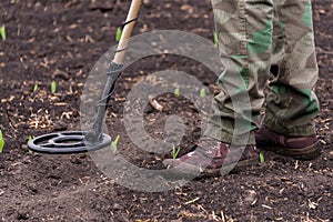 To seek treasures on earth with a metal detector