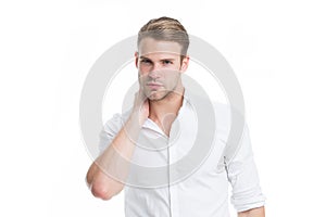 When to worry about neck pain. Neck pain causes symptoms and diagnosis. Man serious face touches neck white background