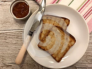 Toast with apricot jam.