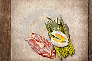 Toast with baked asparagus, boiled egg (top view)