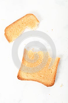 Toast biscuits over white background crunchy food