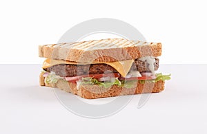 Toast bread burger with cheddar cheese and vegetables