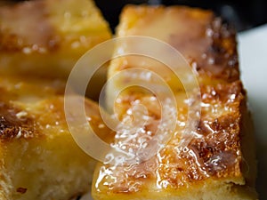 Toast bread butter and sweetened condensed milk, Close up and Macro shot, Selective focus, Snack food concept