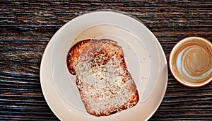 Toast Bread with Cheese on White Plate with Hot Coffee Latte. Morning Meal on Cozy Weekend