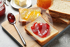 Toast bread with jams on board