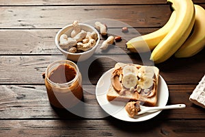 Toast bread with peanut butter and banana slices