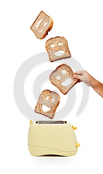 Toast bread and toaster on white