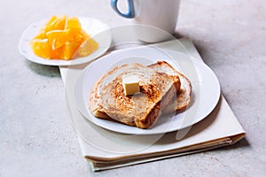 Toast bread on white plate.