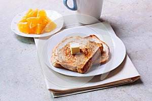 Toast bread on white plate.