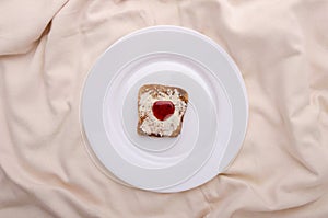 Toast with jam in bed. Good for tea. Healthy drink.