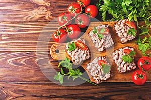 Toast with kosher Forshmak paste, parsley and cherry tomatoes