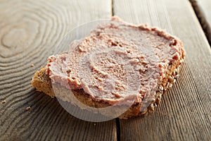 Toast with liver pate on table