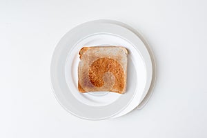 Toast on white plate from above