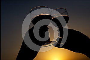 Toast with wine glass silhouette