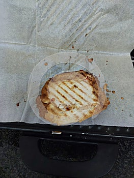 Toast with yellow cheese and tomatoes inside