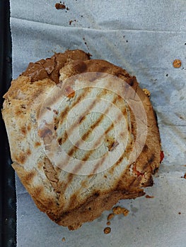 Toast with yellow cheese and tomatoes inside