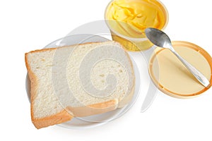 Toasted bread and butter on white background