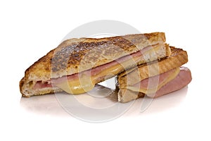 Toasted ham and cheese sandwich, croque monsieur, isolated on white.