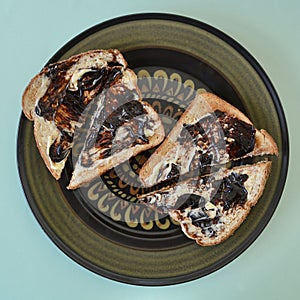 Toasted wholemeal bread with butter and vegemite