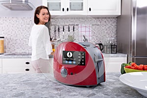 Toaster With Voice Recognition Function On Kitchen Counter