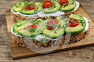 Toasts with avocado and microgreens