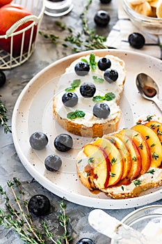 Toasts with berries and fruits. Healthy breakfast concept. Simple and tasty food