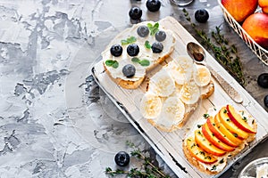 Toasts with berries and fruits. Healthy breakfast concept. Simple and tasty food