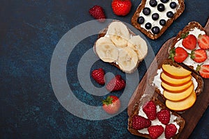 Toasts with cream cheese and fresh berries