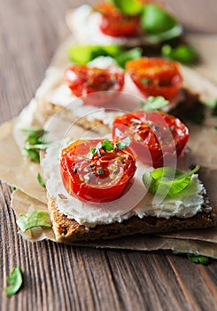 Toasts (Crostini) with ricotta and cherry tomatoes