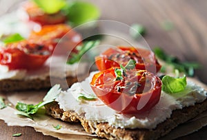 Toasts (Crostini) with ricotta and cherry tomatoes