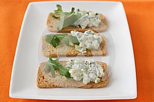 Toasts with cucumber dip