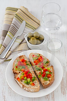 Toasts with cut pepper