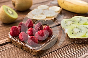 Toasts with fresh fruits and berries