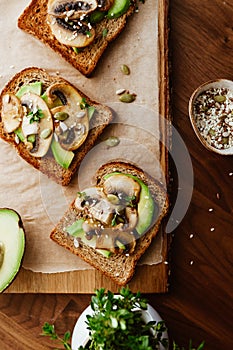 Toasts with fried mushrooms and avocado