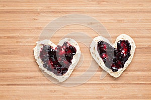 Toasts with jam in a heart shape