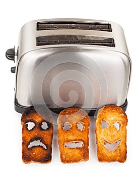 Toasts with smiley face in toaster