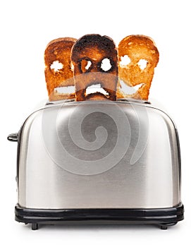 Toasts with smiley face in toaster