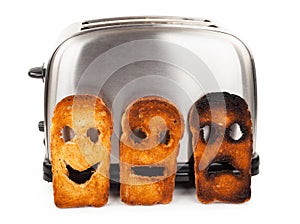 Toasts with smiley face in toaster