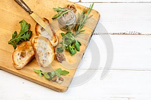 Toasty bread on a wooden board.