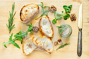 Toasty bread on a wooden board.