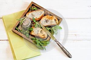 Toasty bread in a wooden box.