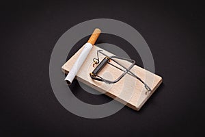 Tobacco Addiction - Cigarettes in Wooden Mousetrap