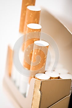 Tobacco in cigarettes with a brown filter