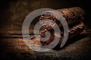 Tobacco cuban havana cigars romeo and julia burned with ash. Beautiful macro background in low key