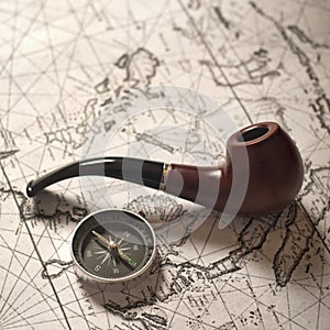 Tobacco pipe & compass