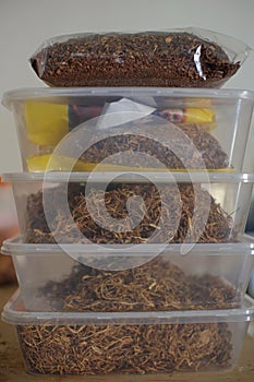 Tobacco of various types is stored in jars