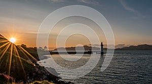 Tobermory lighthouse, scotland photo
